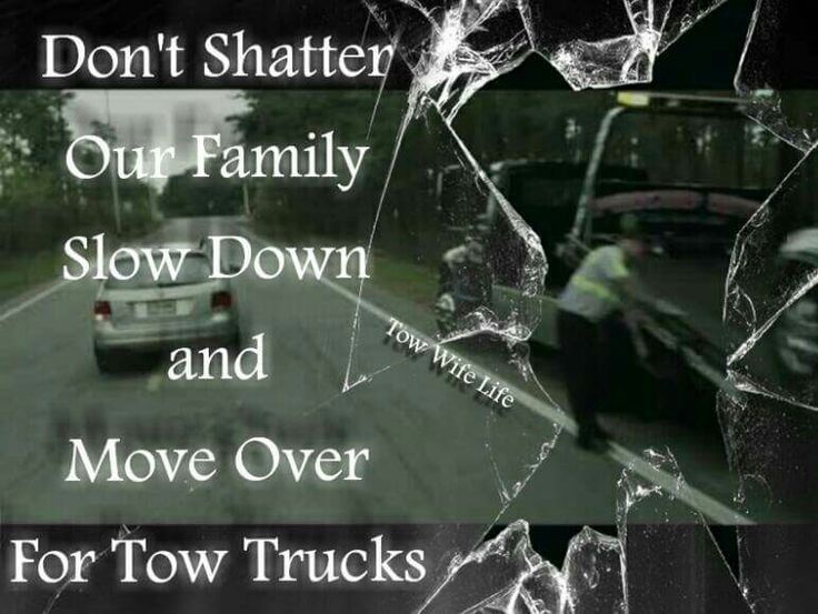 Don't Shatter our Family Slow Down And Move Over for Tow Trucks. Tow truck loading vehicle on busy highway